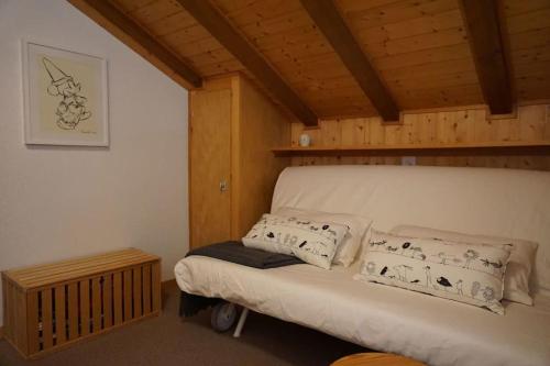 Postel nebo postele na pokoji v ubytování Vue à couper le souffle Arellaz 42