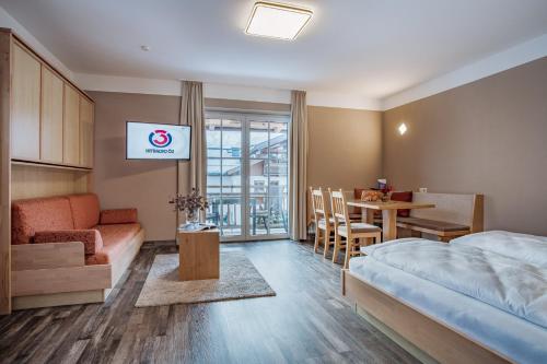 Ένα ή περισσότερα κρεβάτια σε δωμάτιο στο Active Apartments