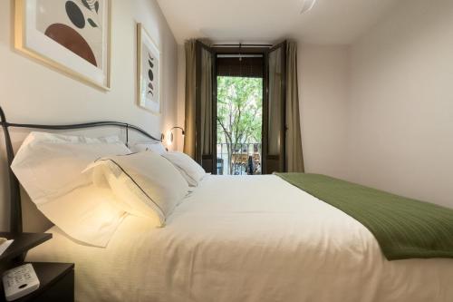 Postelja oz. postelje v sobi nastanitve Stay Barcelona Sant Antoni