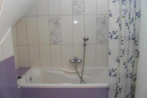 a shower in a bathroom with a tub at Apartment in Zaboric with sea view, balcony, air conditioning 5178-3 in Šibenik
