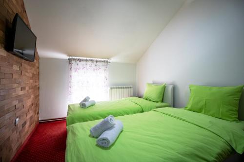 Postel nebo postele na pokoji v ubytování Hostel Aurora
