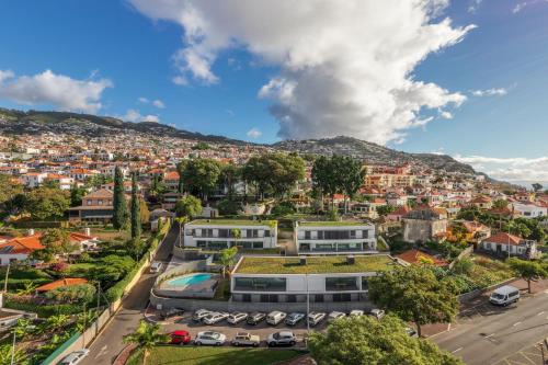 an aerial view of a city with a building at CASA DO MIRADOURO 6 by Heart of Funchal in Funchal