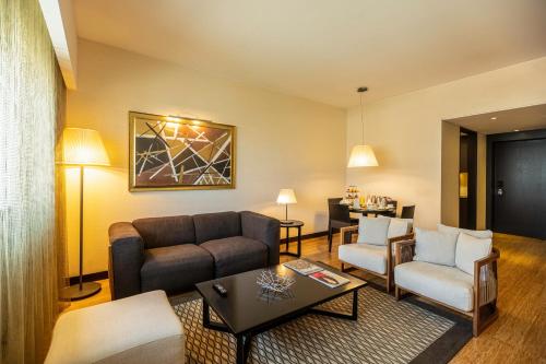  EPIC SANA Luanda Hotel -  Room  picture :   Tea/Coffee maker    Minibar    Bath                           