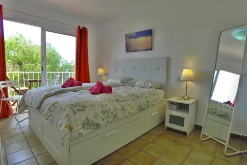 En eller flere senge i et værelse på Casa Vista Bella - Sleeps 9