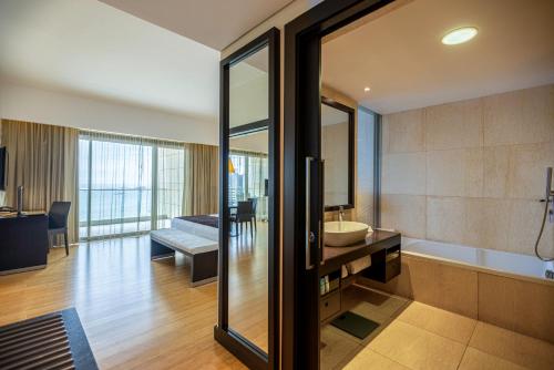  EPIC SANA Luanda Hotel -  Room  picture :   Minibar    Bath    Safety deposit box                           