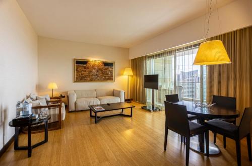  EPIC SANA Luanda Hotel -  Room  picture :   Minibar    Bath    Safety deposit box                           