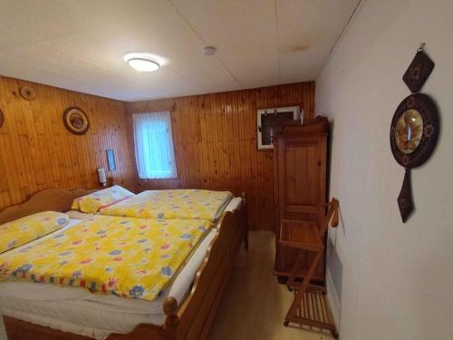 a small bedroom with two beds and a window at Holiday home in Leanyfalu/Donauknie 35231 in Leányfalu