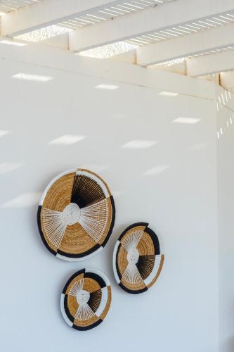 a group of three plates on a ceiling at Pavlo Napa Beach Hotel in Ayia Napa