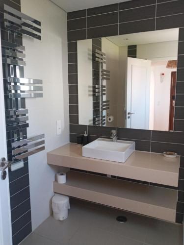 a bathroom with a sink and a mirror at Piece of Paradise @ Balaia Golf Village, Albufeira, PORTUGAL - 4 STAR in Albufeira