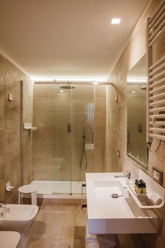 a bathroom with a shower and a sink and a toilet at My Spanishsteps in Rome