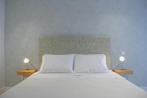 Кровать или кровати в номере Casal da Penha Apartments