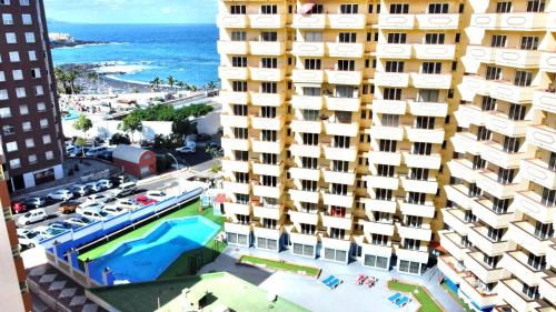 Apartmento a 150m de playa, con piscina climatizada