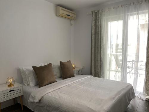Postel nebo postele na pokoji v ubytování Veselinka Apartments & Rooms