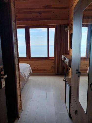 Postel nebo postele na pokoji v ubytování Sarı Köşk Hotel