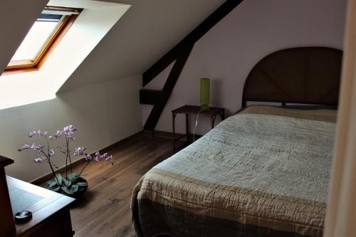 Postel nebo postele na pokoji v ubytování B&B La Gautraie