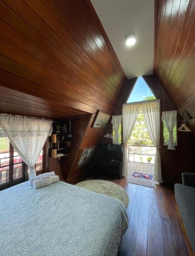 Ένα ή περισσότερα κρεβάτια σε δωμάτιο στο PunNa Homestay @ Bangsai