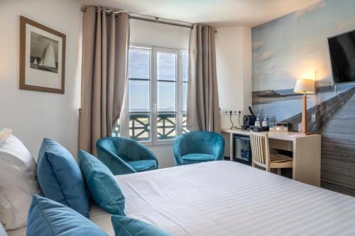 Letto o letti in una camera di SOWELL HOTELS Le Beach