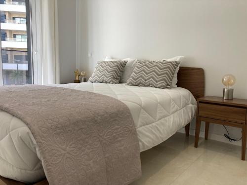 Ліжко або ліжка в номері Portus Magnus Residence