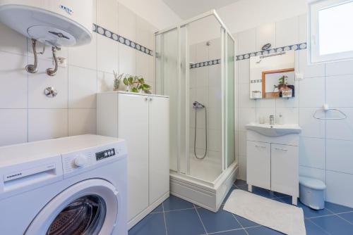 Ένα μπάνιο στο Apartments Trossana