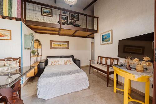 Ένα ή περισσότερα κρεβάτια σε δωμάτιο στο Casa p/4, wifi, ar, garagem