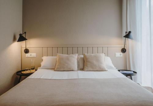Postel nebo postele na pokoji v ubytování Hotel Llane Petit