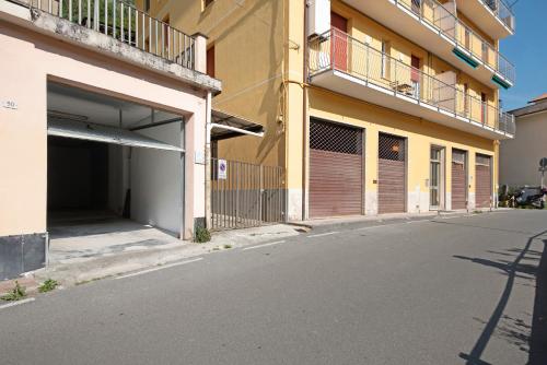 an empty street in front of a building at Moneglia Monte in Moneglia