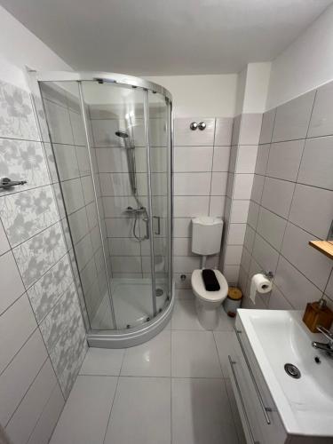 Koupelna v ubytování SunSet Beach Apartman