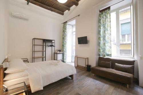 Postel nebo postele na pokoji v ubytování Antica Residenza Fusco