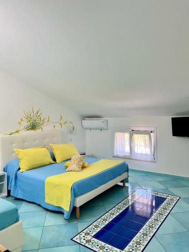 B&B A Casa di Vittoria - Guest House tesisinde bir odada yatak veya yataklar