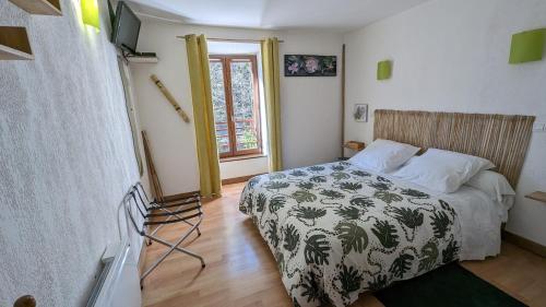 Posteľ alebo postele v izbe v ubytovaní Chambres d'hôtes Les Lits des Fées
