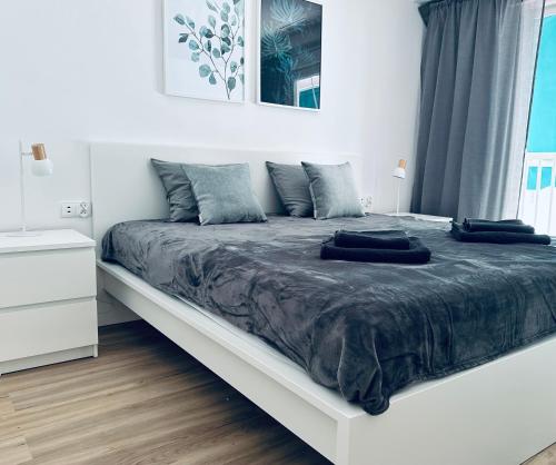 Säng eller sängar i ett rum på Welcome & Bienvenido a Santa Pola Apartamento a 30 metros de la Gran Playa