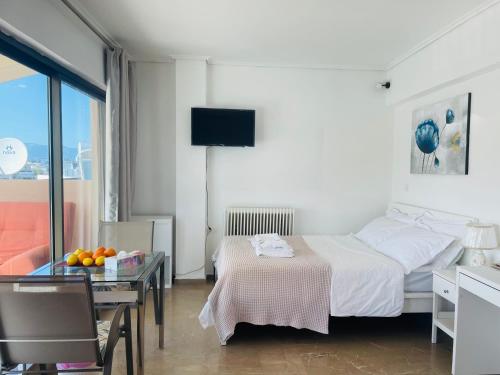 Ένα ή περισσότερα κρεβάτια σε δωμάτιο στο Top floor apartment