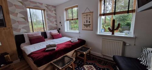 Postel nebo postele na pokoji v ubytování B&B Duinbrink