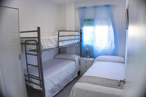 Postel nebo postele na pokoji v ubytování Apartamento Vistas de Doñana