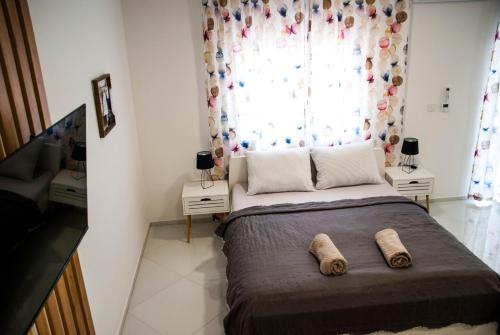 Voodi või voodid majutusasutuse Apartments Lisinski - Private parking toas