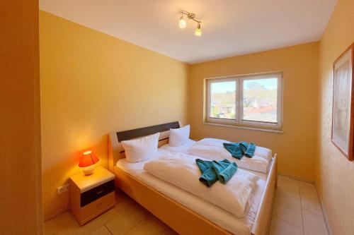 Postel nebo postele na pokoji v ubytování Haus Isabel Jägerstrasse 10b Ferienwohung 6