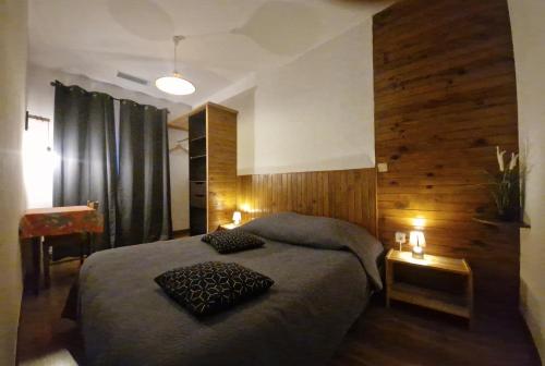 Katil atau katil-katil dalam bilik di Chalet les moineaux Appartements