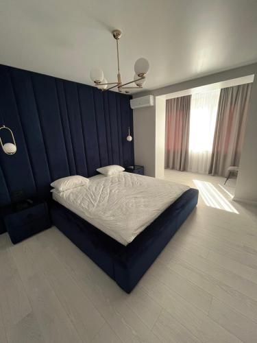 Кровать или кровати в номере Апартаменти Люкс3 зі світлом