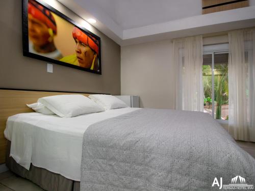 Katil atau katil-katil dalam bilik di AJ TERMAS HOTEL IRAÍ