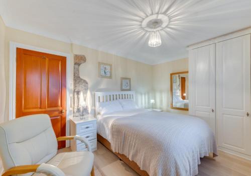 Postel nebo postele na pokoji v ubytování Bwthyn Benllech