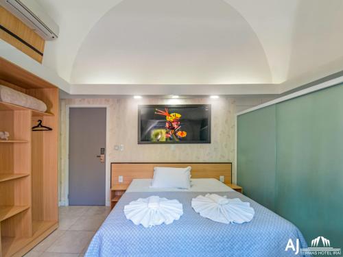 Katil atau katil-katil dalam bilik di AJ TERMAS HOTEL IRAÍ
