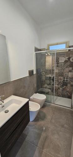 Koupelna v ubytování Villa Rita Apartament & Rooms