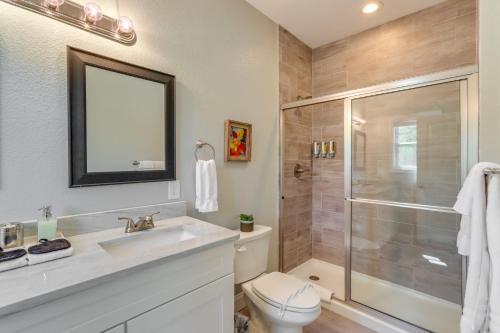 a bathroom with a shower and a toilet and a sink at Charming Helen Vacation Rental 2 Mi to Village! in Helen