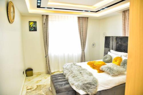 TV a/nebo společenská místnost v ubytování Elegant 3-Bedroom Condo with Pool, Gym & Free Wi-Fi