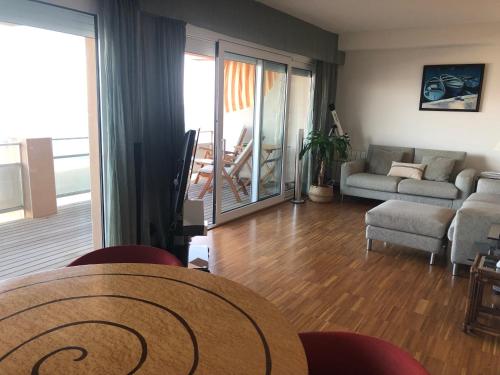 Istumisnurk majutusasutuses Apartamento en 1ª linea de mar con excepcionales vistas a la bahia en Sant Antoni de Calonge
