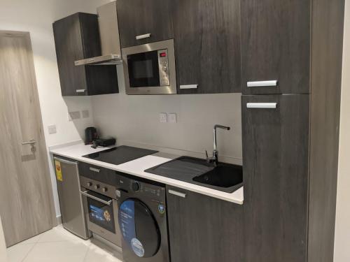 Foto sihtkohas Accra asuva majutusasutuse The Lennox Suites by Cozy galeriist