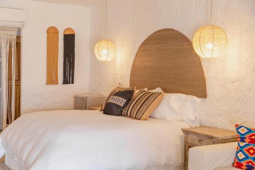 Postel nebo postele na pokoji v ubytování Bora Bora Beach Club & Hotel