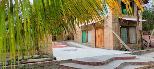 Κήπος έξω από το Tambo Marina Eco Hostal