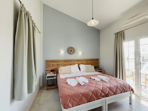 Postel nebo postele na pokoji v ubytování Miramare Apartments