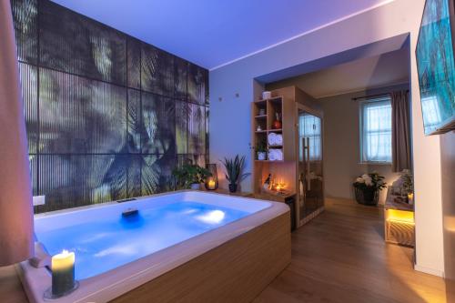 a large bathroom with a large soaking tub at Archè Design Rooms and Suites in Palermo